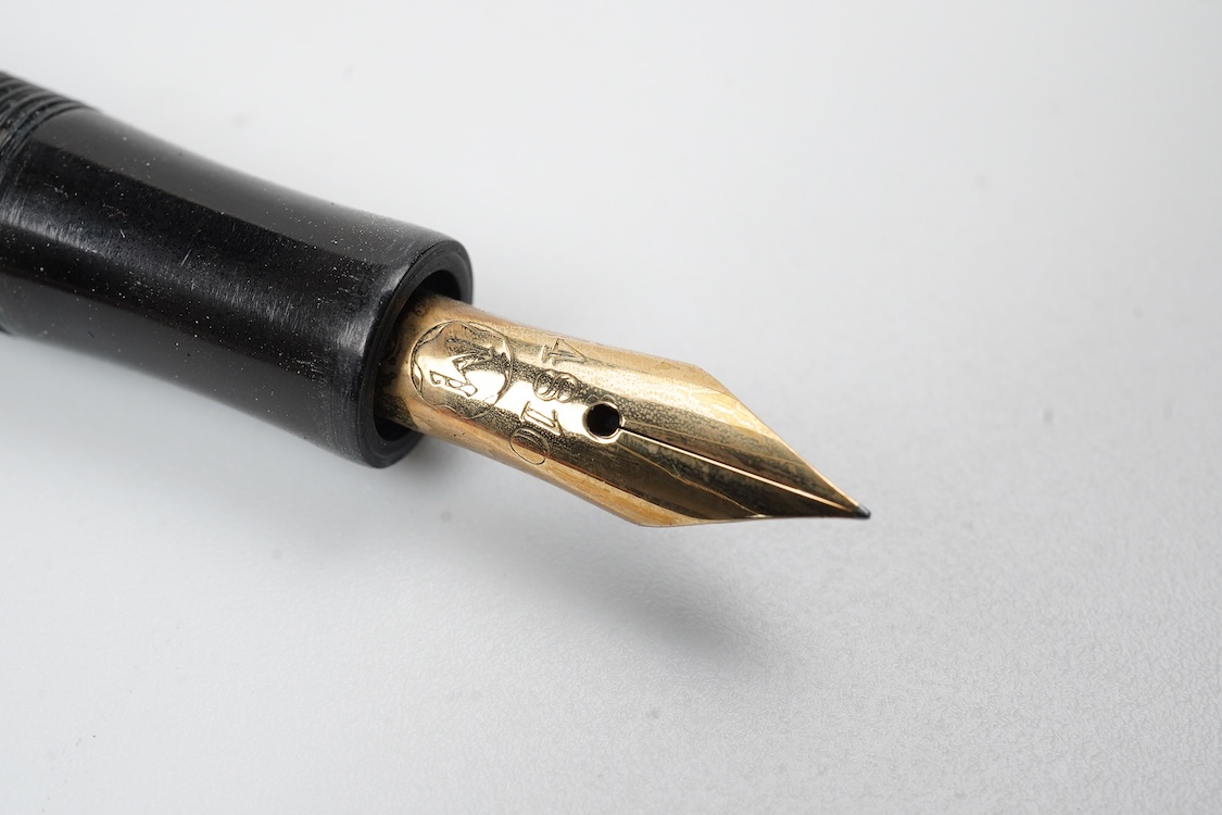A rare Montblanc high top fountain pen in brown and black marble barrel with black cap